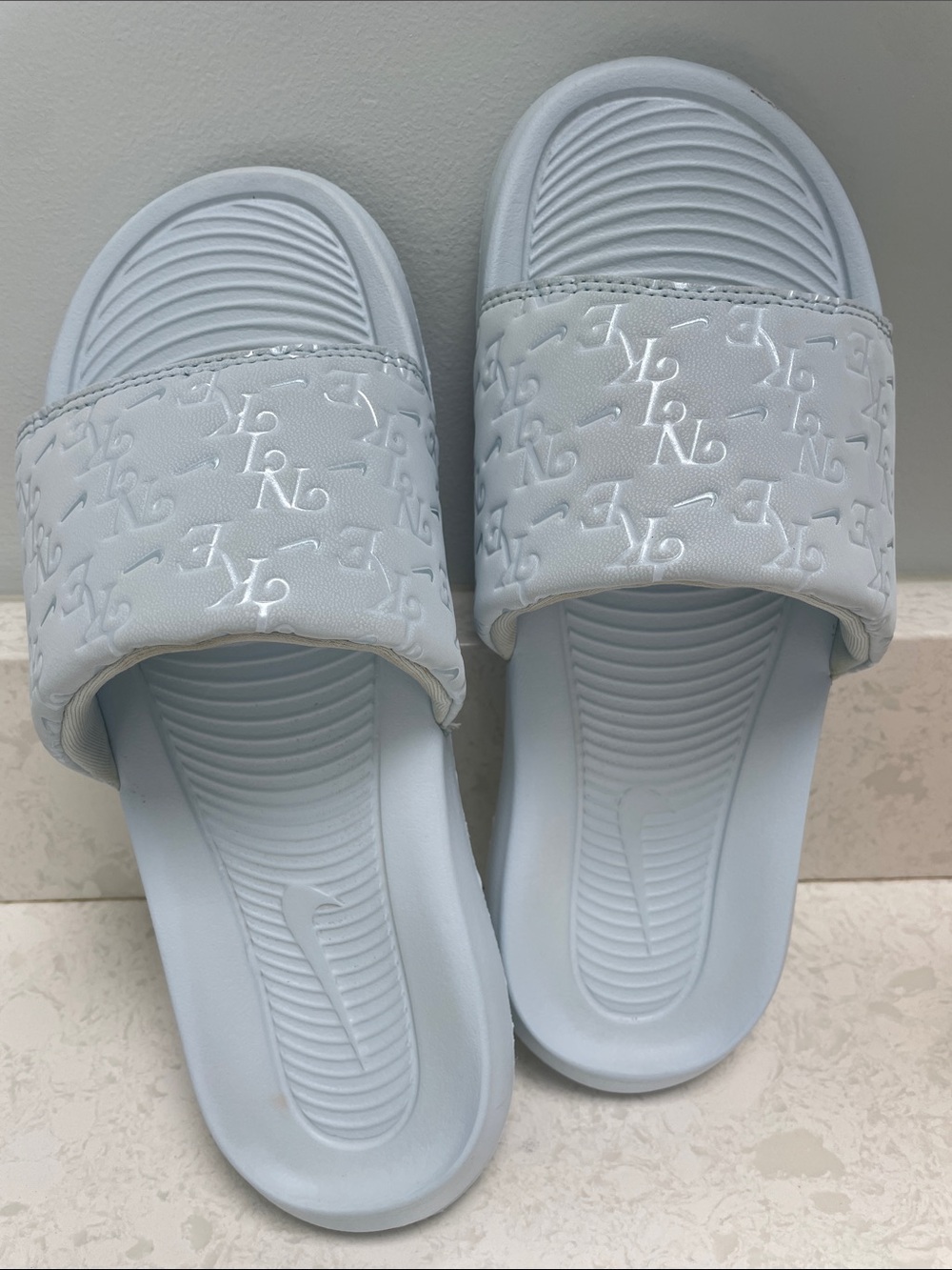 Nike Women's Pale Blue Logo Slide Sandals